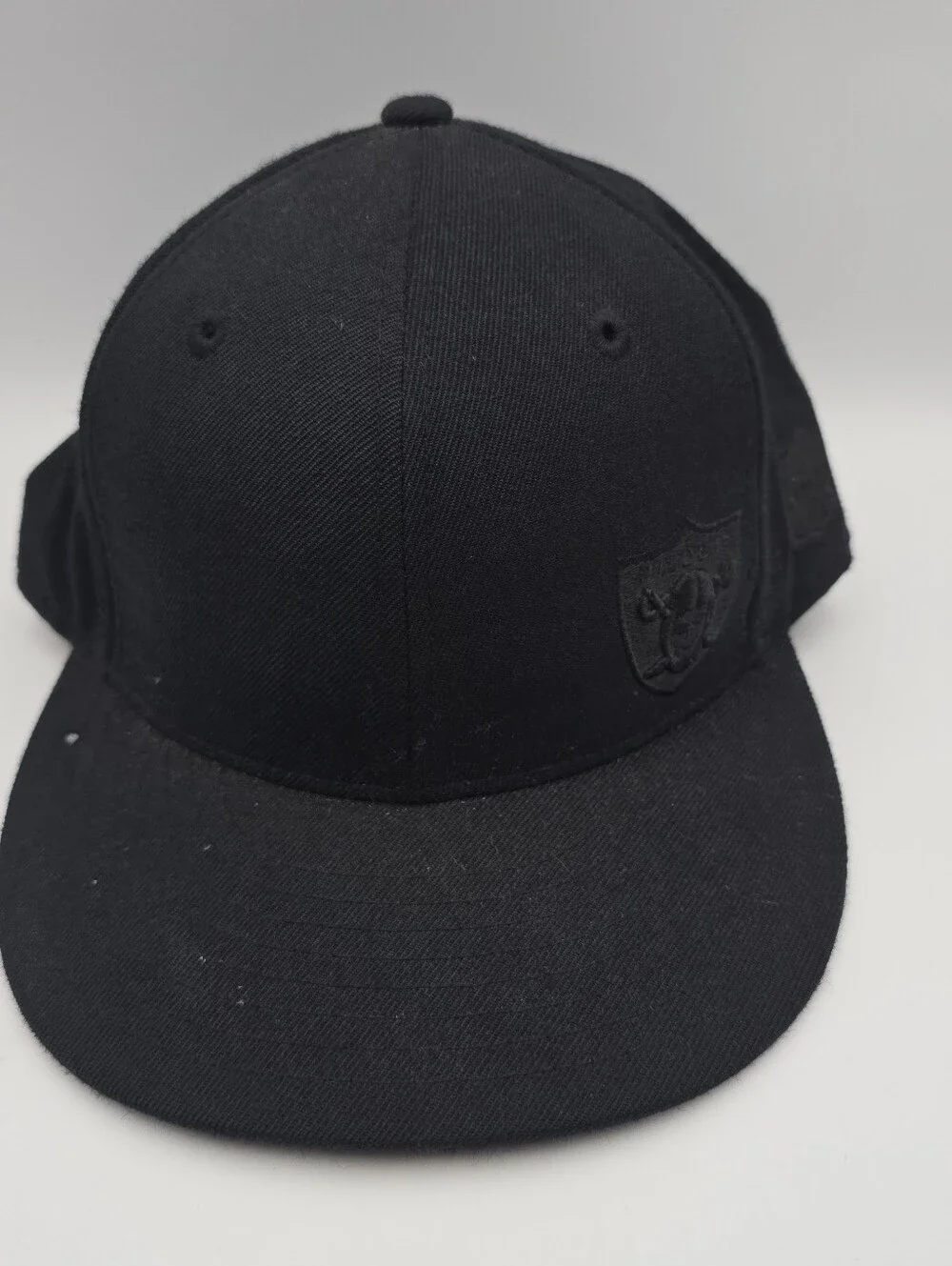 Reebok NFL Oakland/Las Vegas Raiders All Black Wool Fitted Hat Size 7 3/8